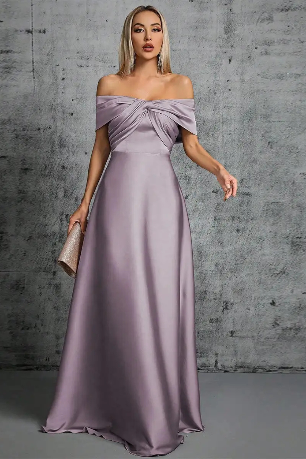 Women's elegant off-shoulder maxi dress, featuring a graceful twisted knot bodice.