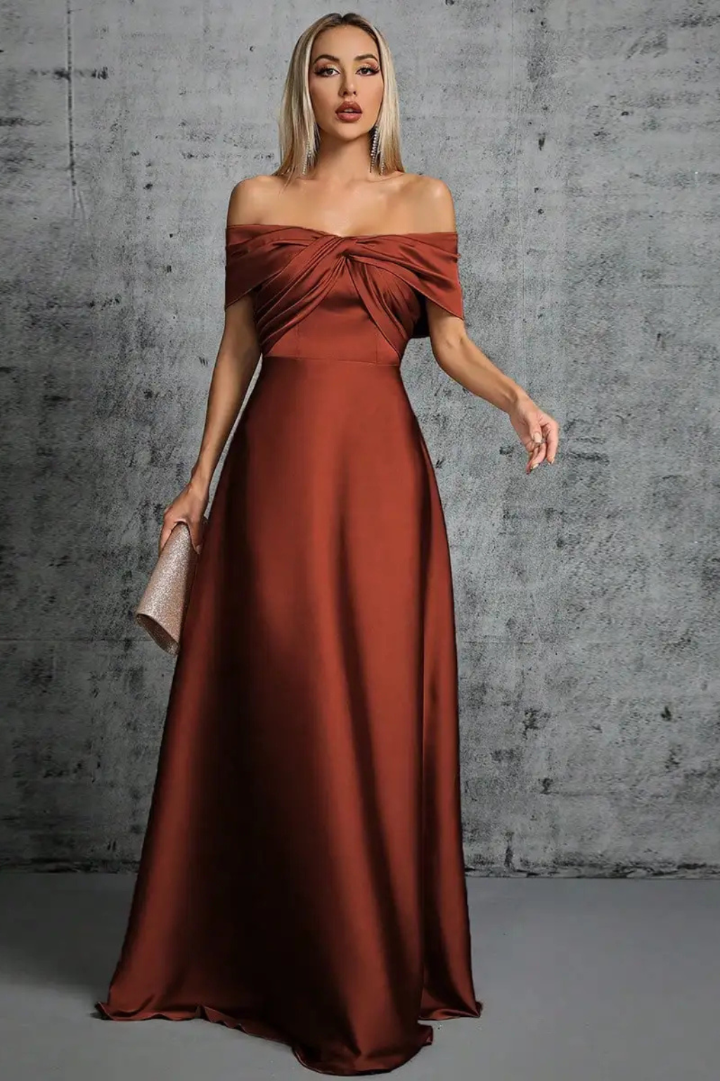 Beautiful purple off-shoulder twisted knot maxi dress, ideal for elegant occasions.