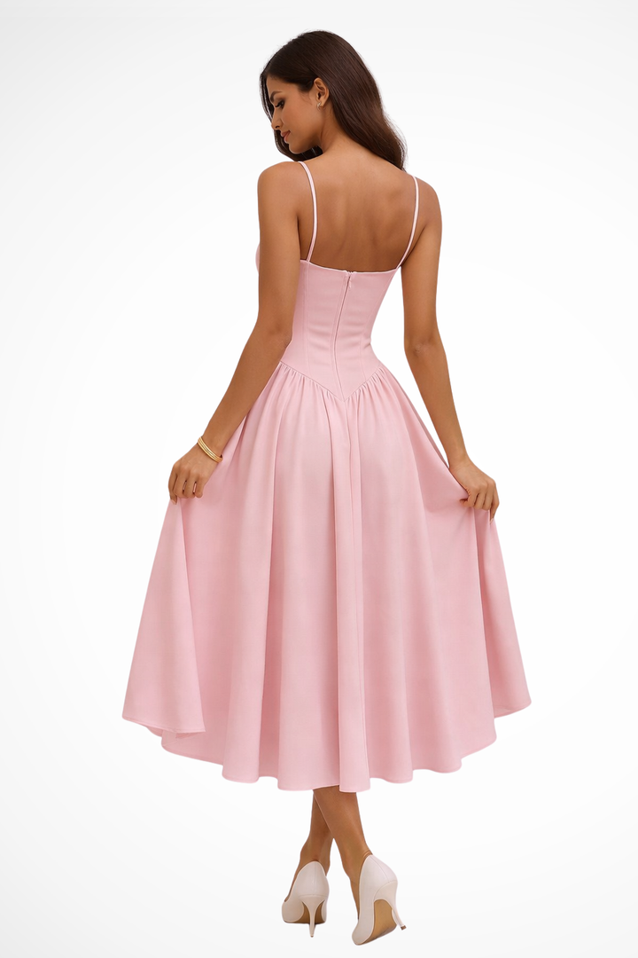 Fitted women's pink A-line midi dress with elegant corset. Ideal stylish occasion dress for guests & formal events.