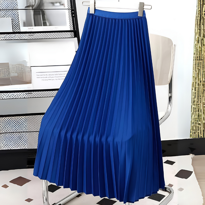 Versatile women's pleated high-waist midi skirt. Elegant long skirt for various occasions, from casual to formal.