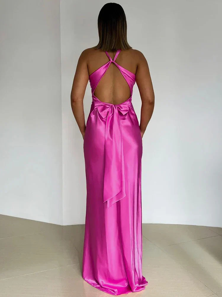 Elegant satin halter neck evening dress for women with sleek silhouette and glossy finish, perfect for formal events.