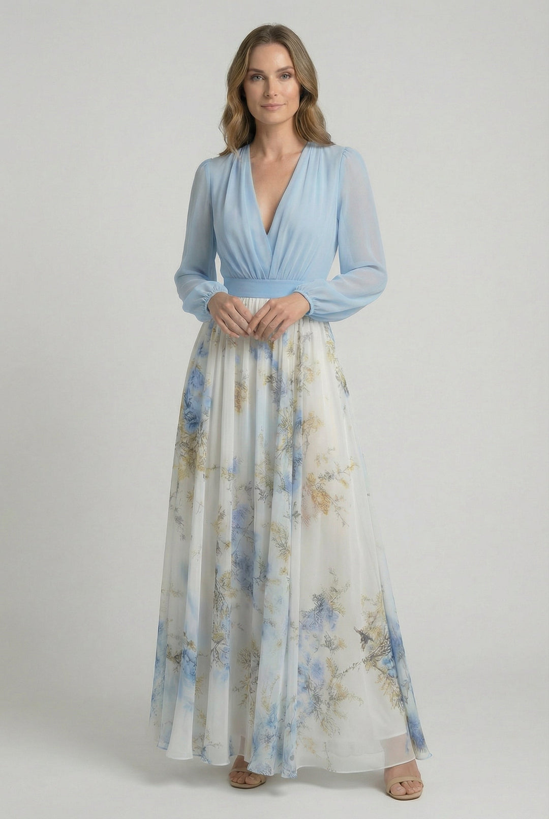 Elegant sky blue floral maxi dress for women, perfect for summer occasions, features a sophisticated V-neck and long sleeves.