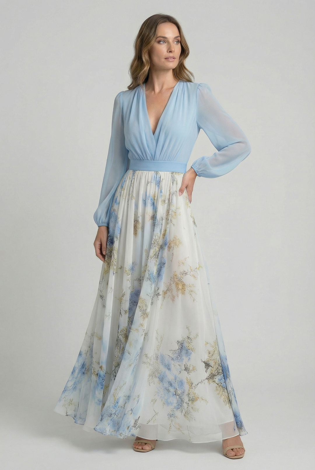 Women's elegant floral maxi dress, ideal for wedding guests or summer parties. Features a flowing silhouette & sky blue pattern.