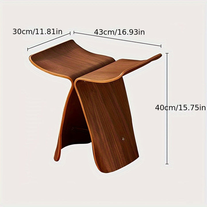 Elegant solid wood butterfly stool, a timeless piece of accent furniture for versatile home styling.