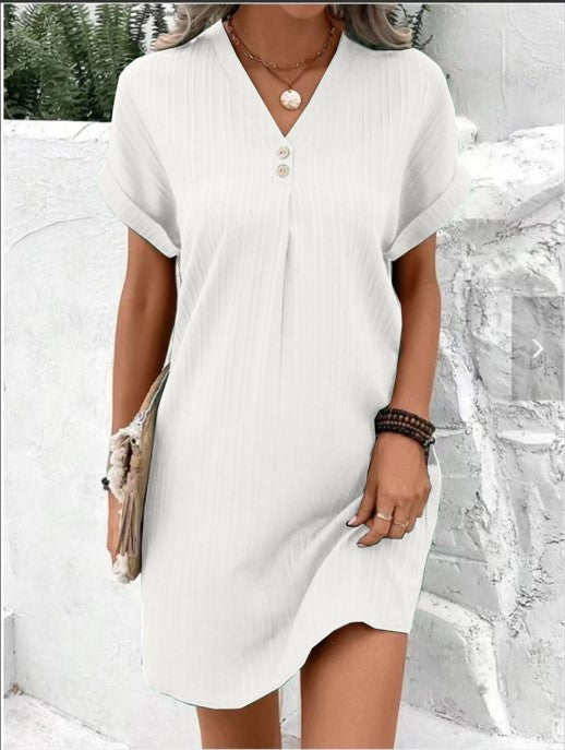 Fashionable women's summer dress with a flattering V-neck and decorative buttons, great for a chic casual look.