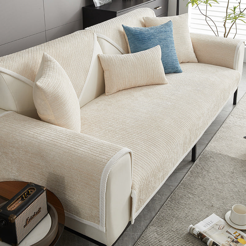 Elegant waterproof chenille sofa cover in soft hues, offering antimicrobial protection and sleek design for home decor.