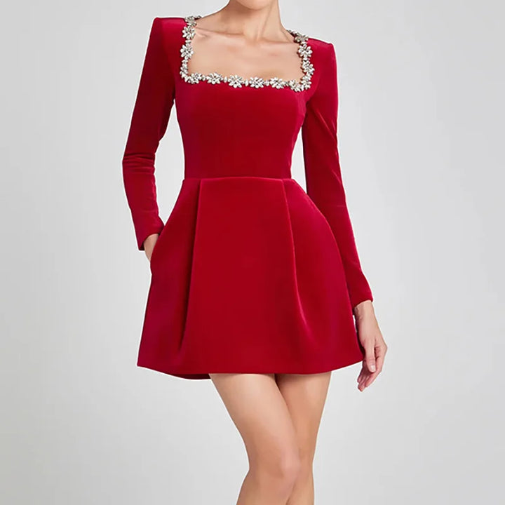 Red mini dress with square neck and long sleeves, a stylish choice for celebrations.