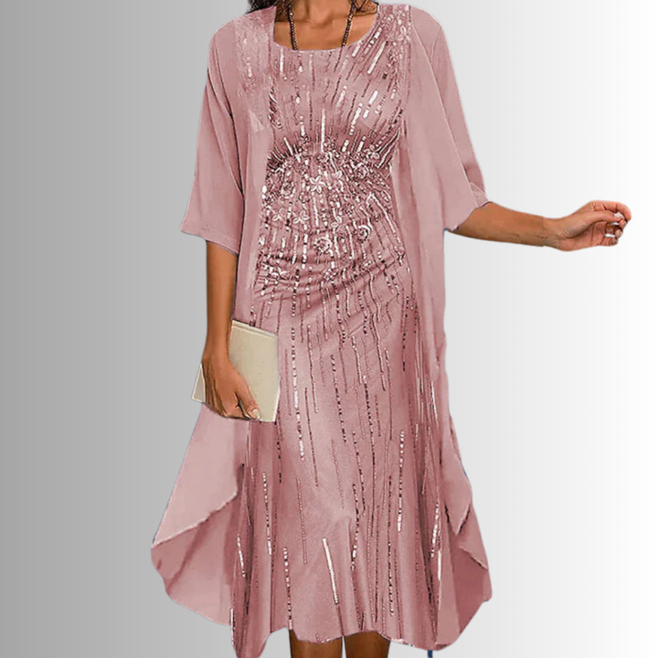 Stylish women's elegant two-piece set for summer, featuring a comfortable flowy blouse and dress.