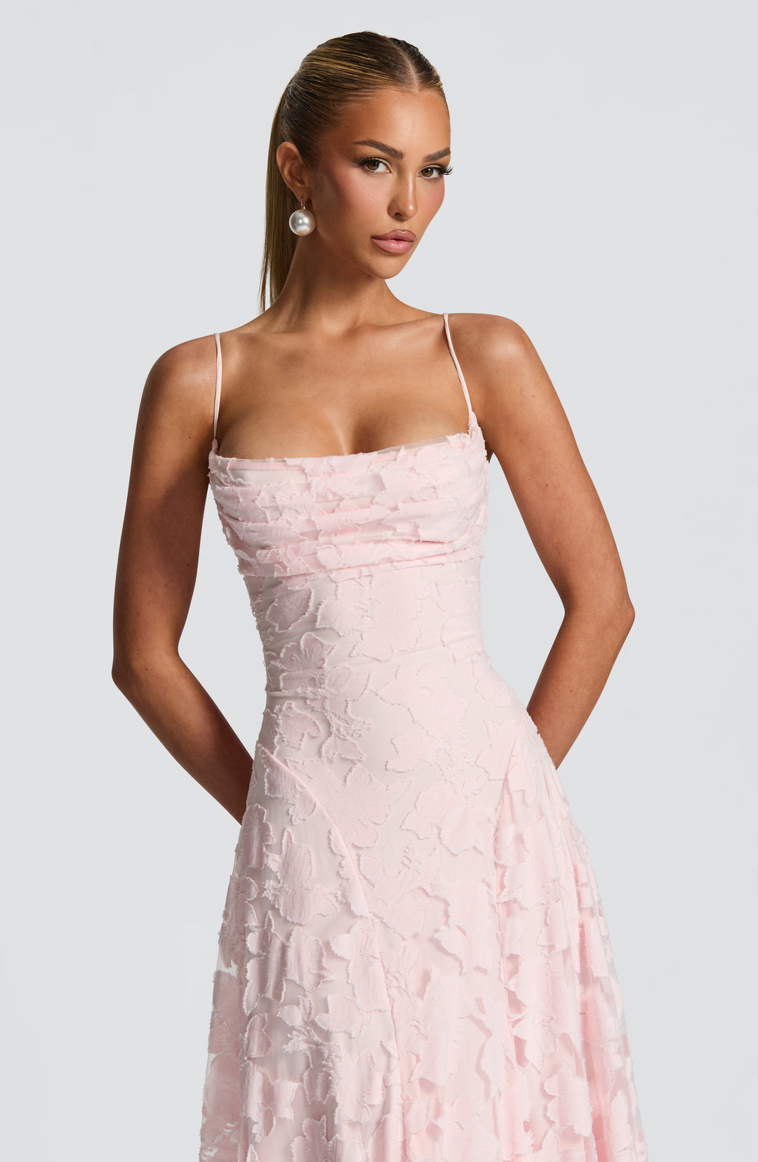Women's long elegant summer dress: backless, spaghetti strap, maxi style, ideal for evening wear.