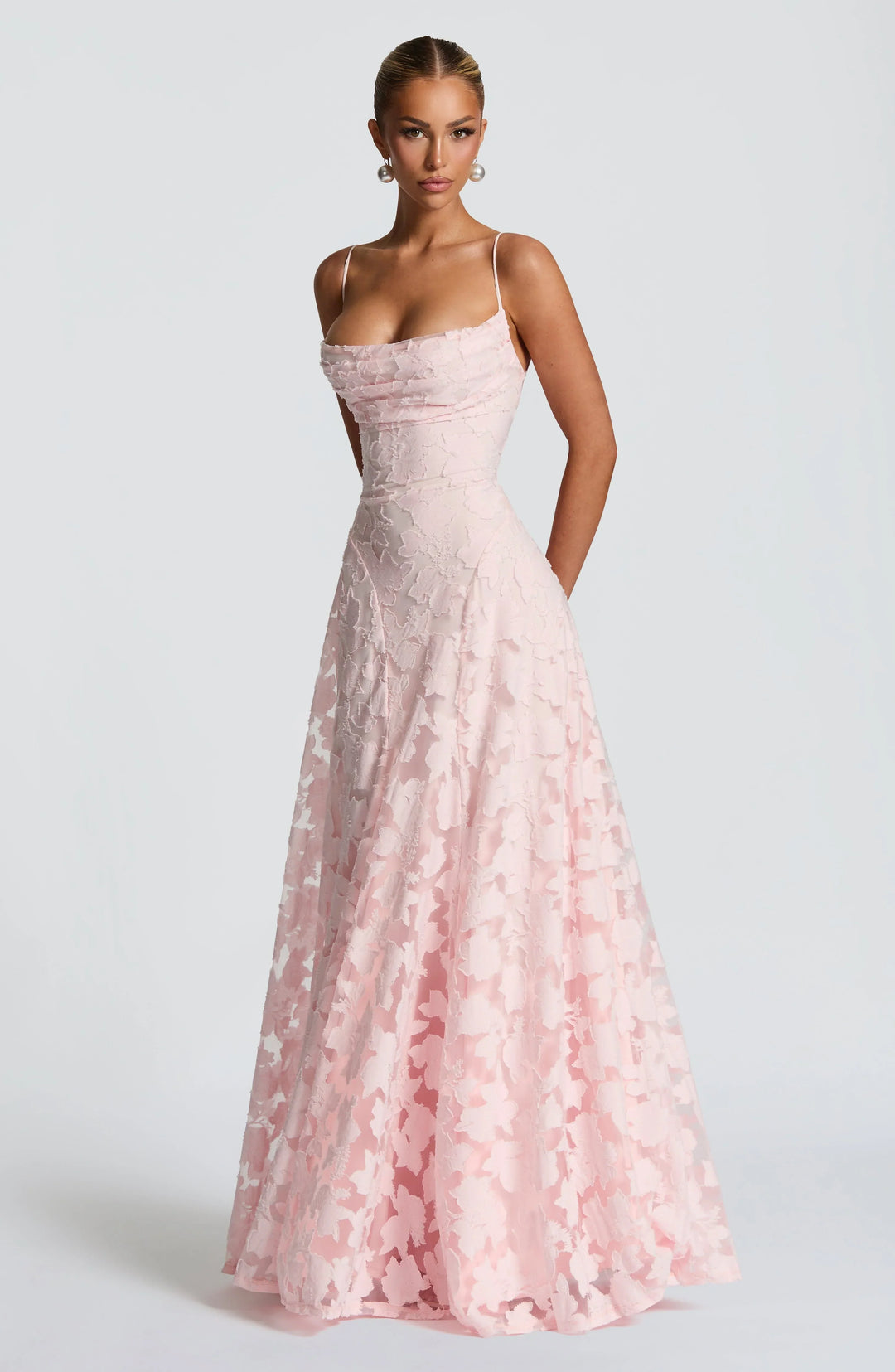 A women's backless spaghetti strap maxi dress, perfect as a stylish summer evening party outfit.