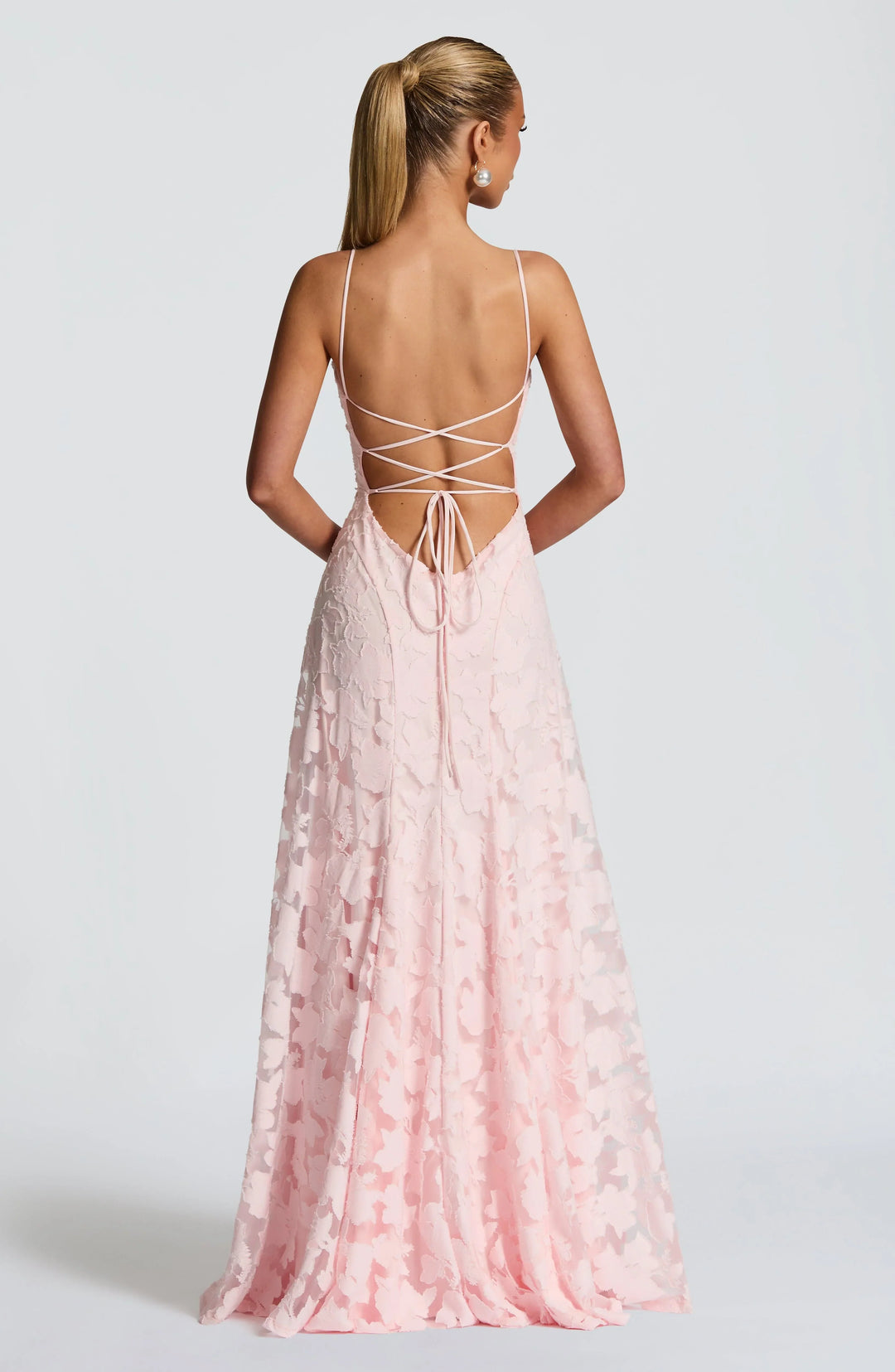 Sleek women's backless formal maxi dress with spaghetti straps, perfect for summer events.