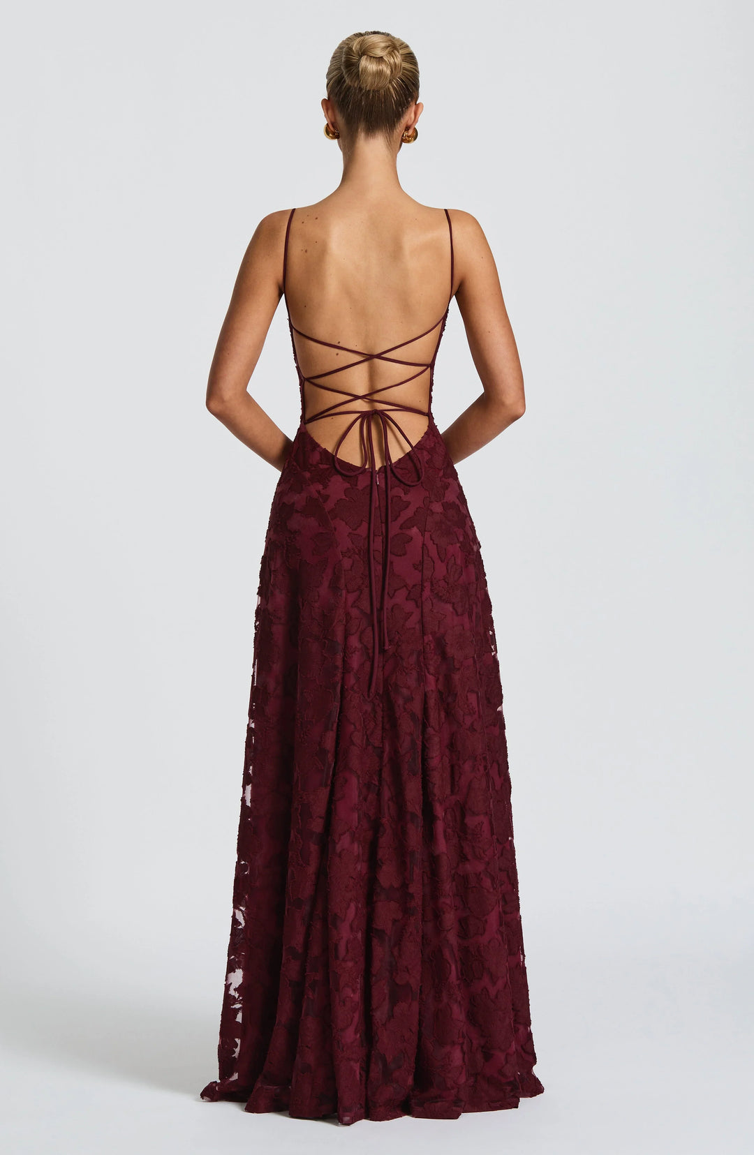 Chic backless party dress for women; a long maxi with elegant spaghetti straps & a high waist.