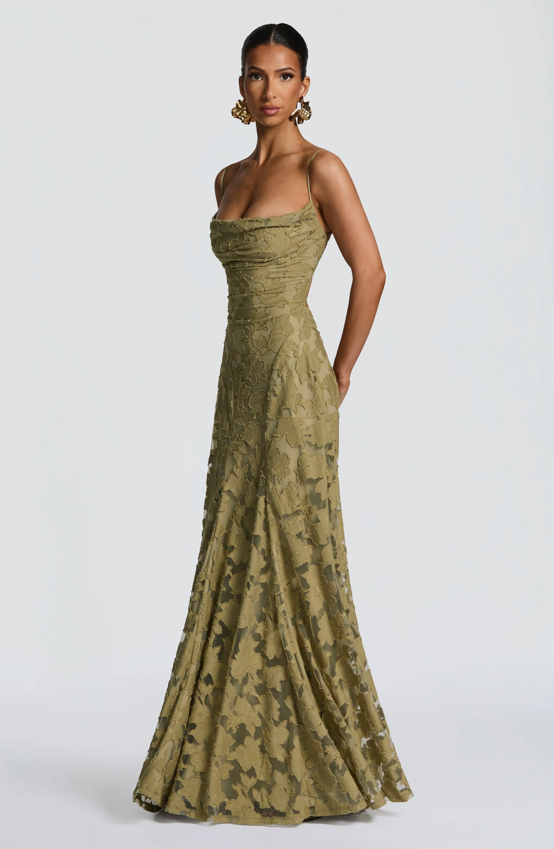 Sophisticated women's evening dress, a backless maxi with thin spaghetti straps for summer wear.