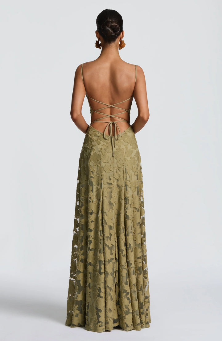 Women's elegant high-waist maxi dress, backless with thin spaghetti straps, perfect for events.