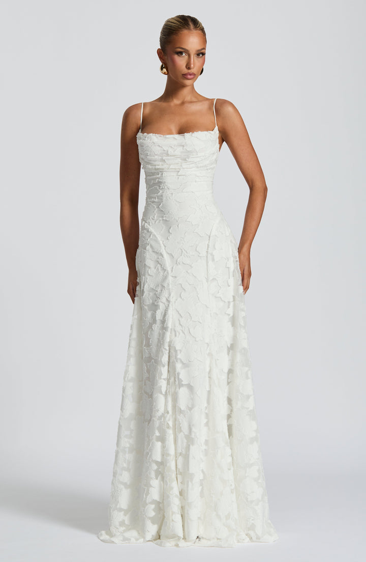 Flowy backless summer maxi dress for women, designed with delicate spaghetti straps for evenings.