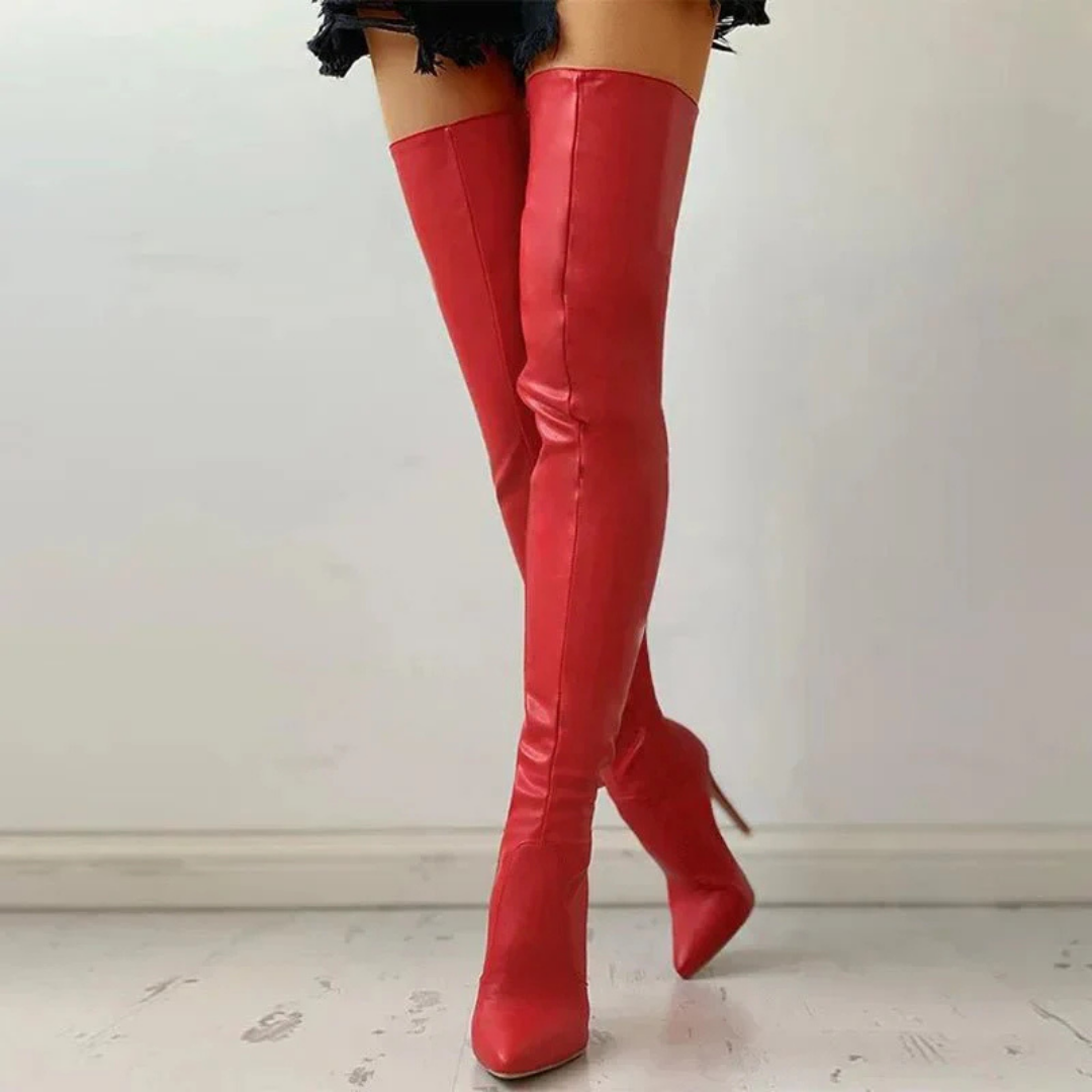 Elegant women's black thigh-high pointed toe boots with high heel and side zipper, perfect for evening wear.