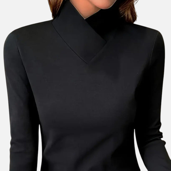 Versatile women's criss-cross neck blouse, an elegant long sleeve top for chic workwear or smart casual winter style.