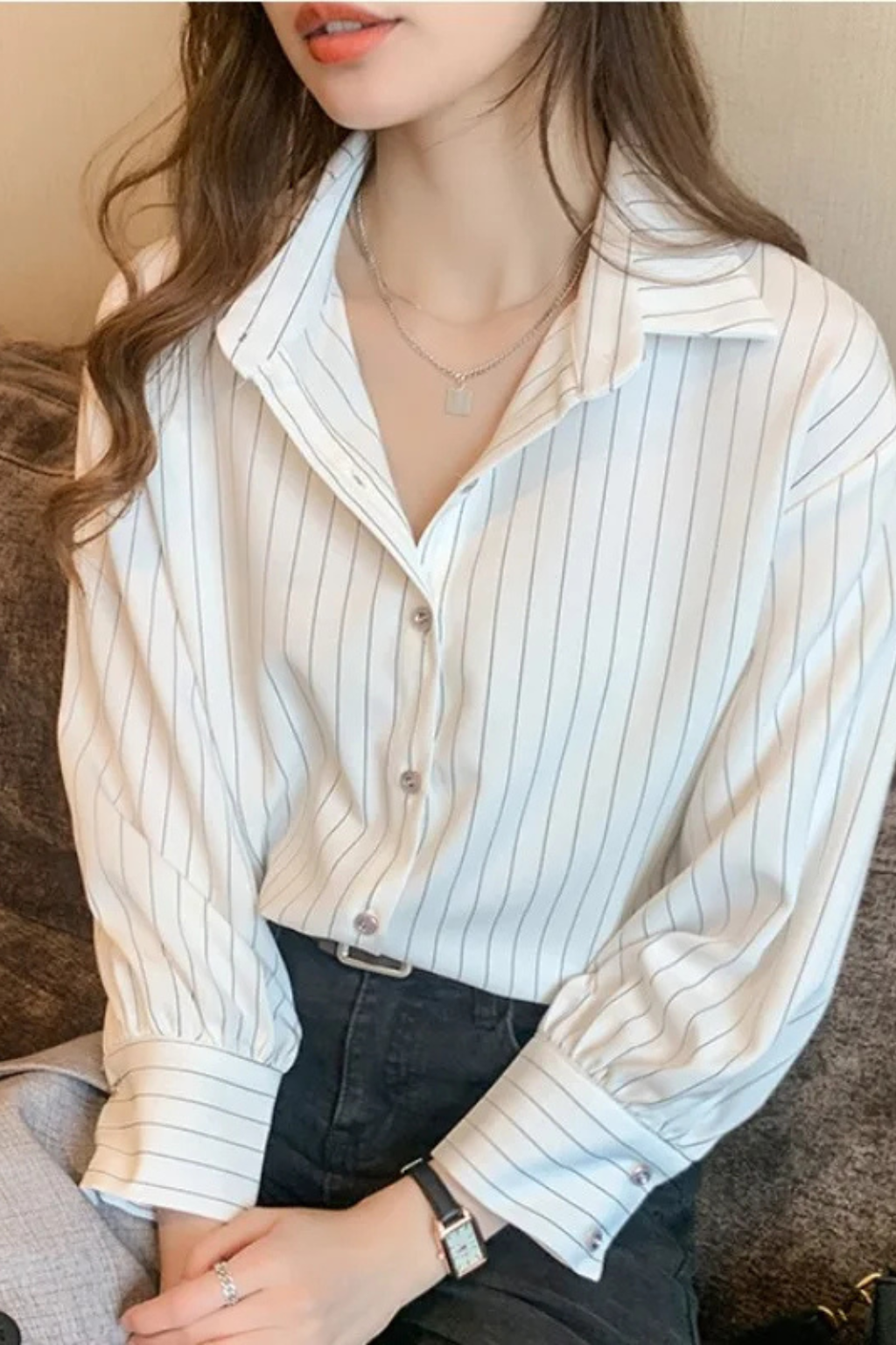 Sophisticated women's striped long sleeve button-down shirt, featuring a turn-down collar, ideal for any occasion.