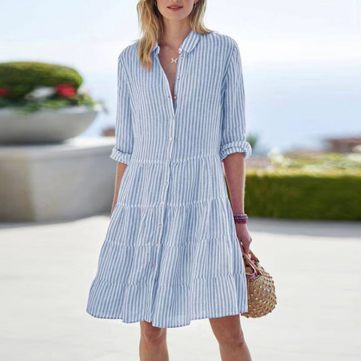 Elegant women's breezy summer dress, lightweight & flowy, perfect for casual or party wear.