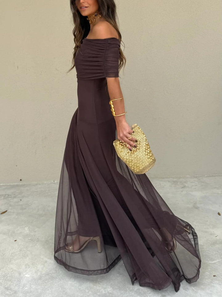 Sophisticated brown maxi dress with mesh overlay, an elegant choice for formal events and wedding guests.