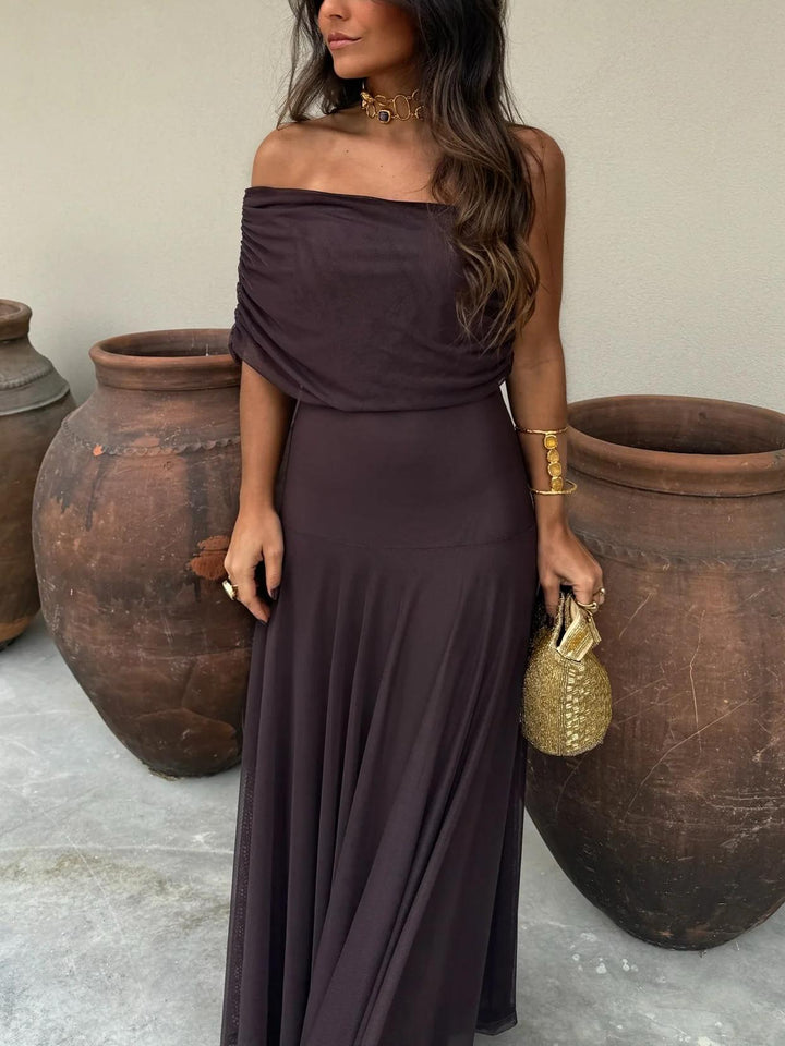 Formal brown maxi dress with an elegant mesh overlay, designed for women attending weddings or galas.