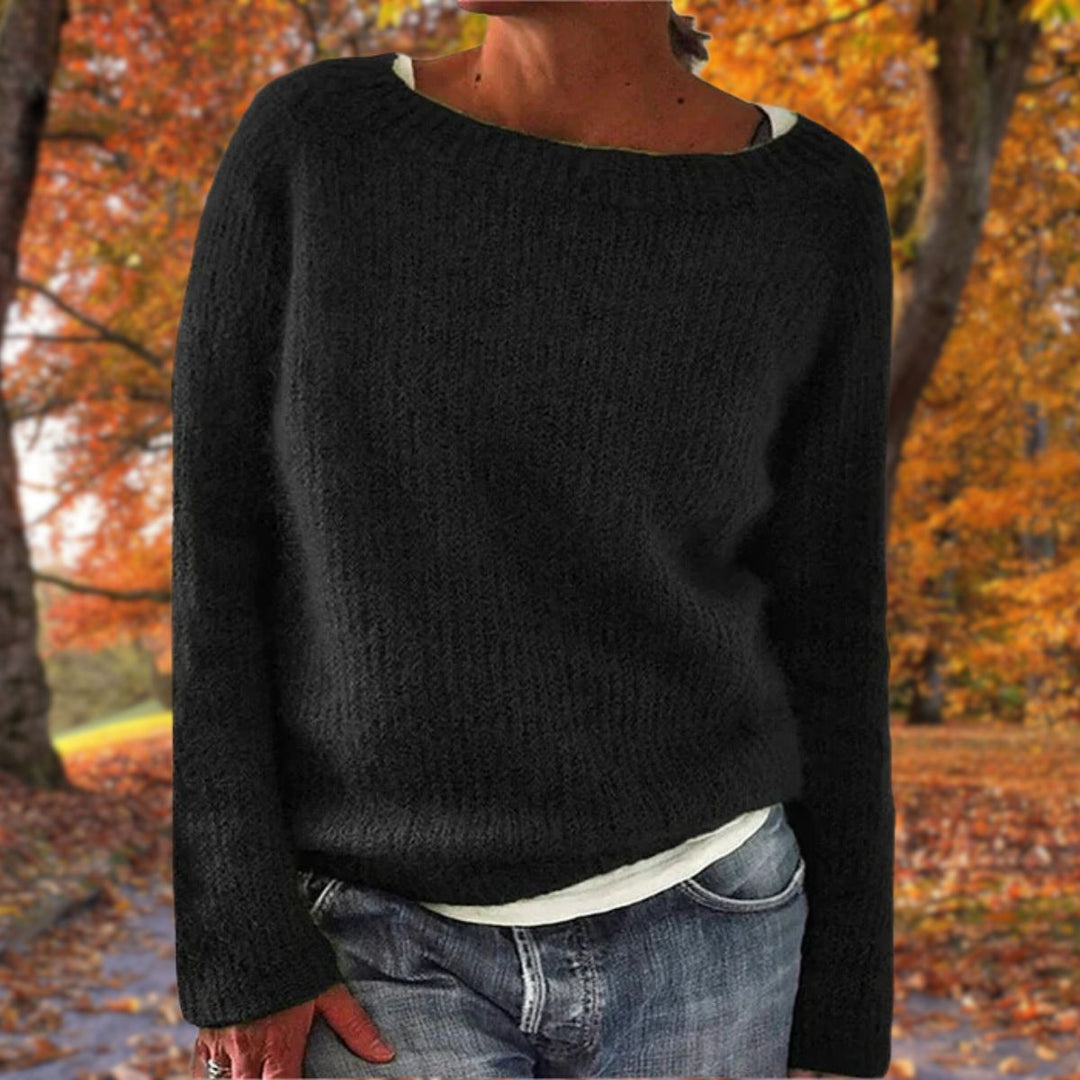 Comfortable women's knitwear pullover. Relaxed fit, cozy texture for warm autumn & winter style.
