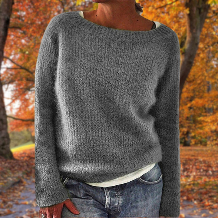 Women's relaxed fit classic knit sweater. Cozy, warm pullover for elegant autumn & winter wear.