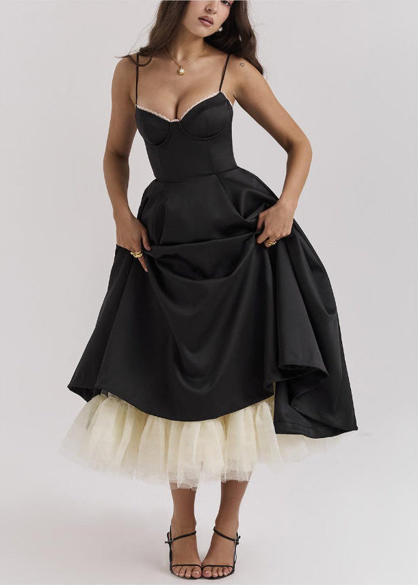 Stylish women's midi dress featuring a structured corset top and a flowing full skirt for elegant wear.