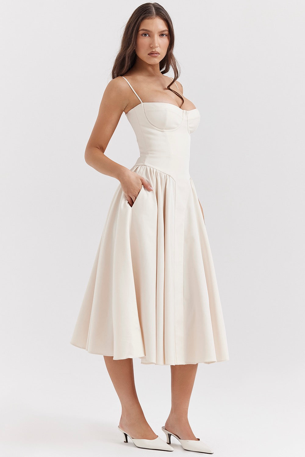 Chic women's midi dress featuring a flattering corset design & adjustable shoulder straps.