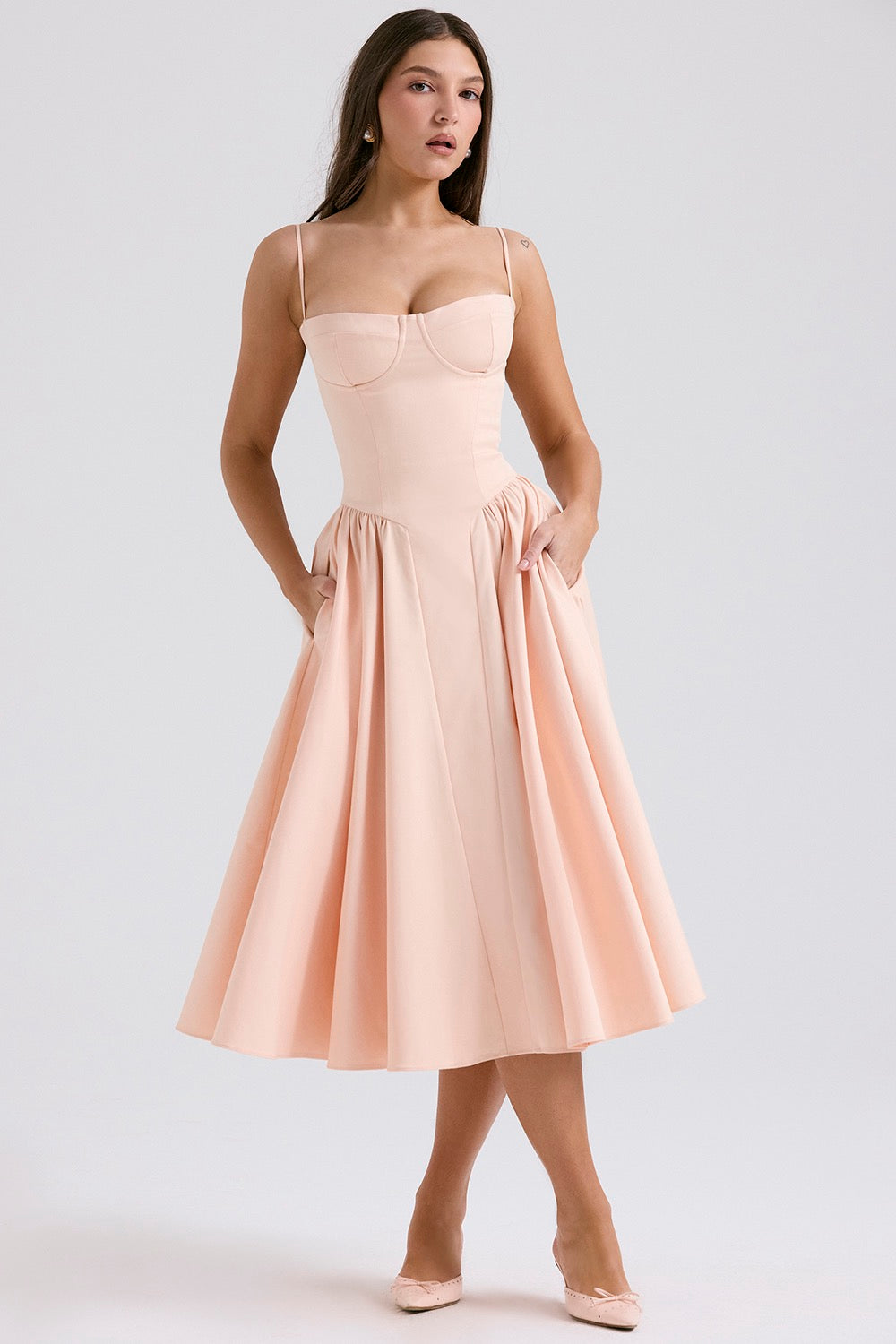Feminine corset midi dress for women, elegant style with adjustable straps for occasion wear.