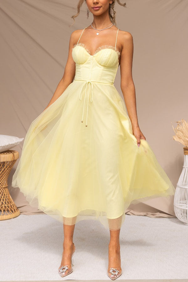 Elegant women's spaghetti strap midi dress with a flattering corset silhouette & voluminous tulle skirt.