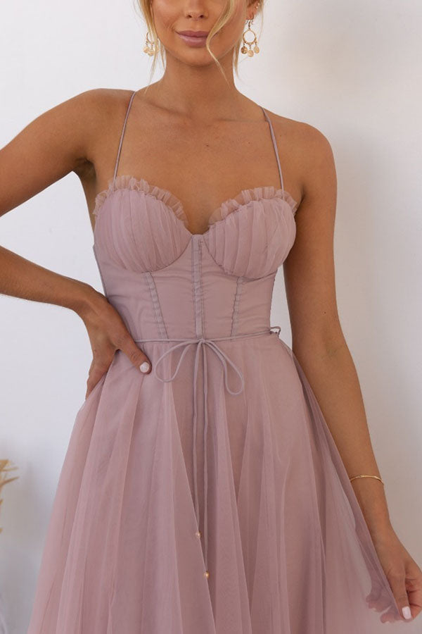 Summer-ready elegant midi dress for women, with a corset bodice and graceful tulle skirt design.