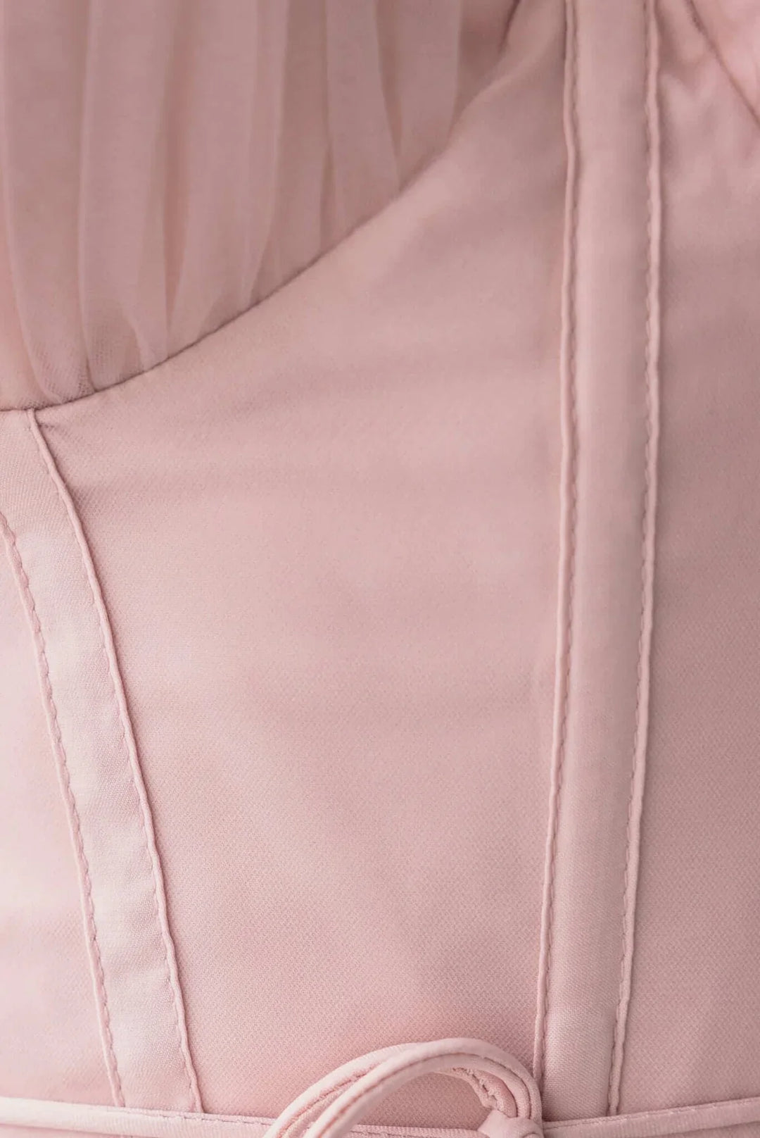 Women's formal corset midi dress, showcasing a structured bodice & airy tulle skirt with thin straps.