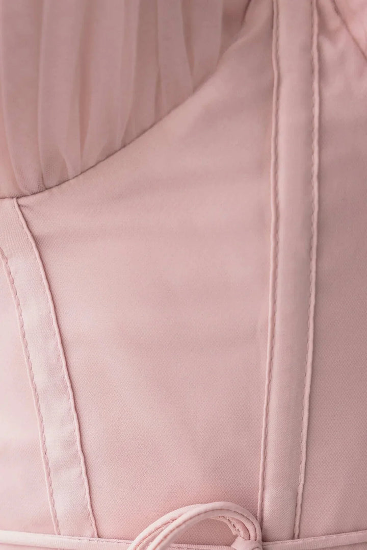 Women's formal corset midi dress, showcasing a structured bodice & airy tulle skirt with thin straps.