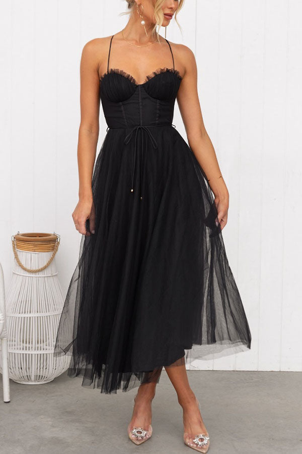 Stunning women's tulle midi dress with a flattering corset top and delicate spaghetti straps, A-line.