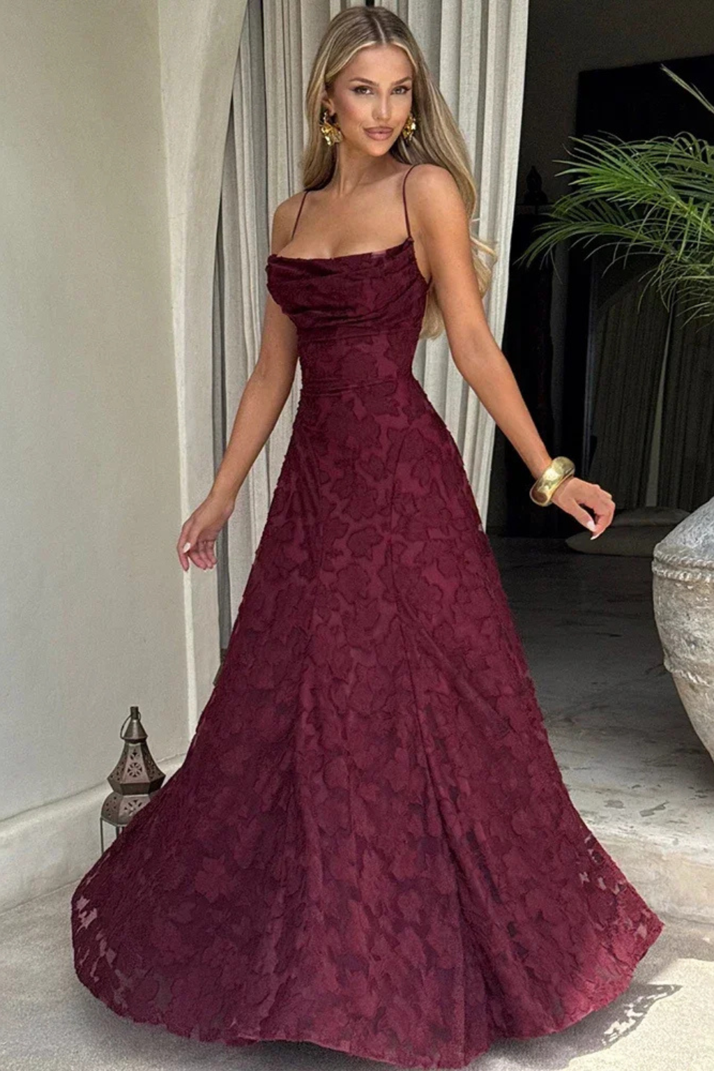 Sophisticated floral jacquard maxi dress for women, featuring a lace-up back and spaghetti straps. Ideal for galas.
