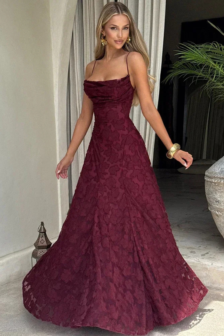 Sophisticated floral jacquard maxi dress for women, featuring a lace-up back and spaghetti straps. Ideal for galas.