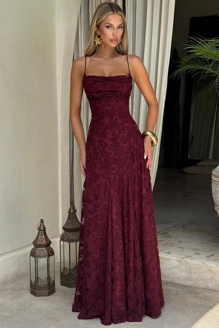 Stunning backless lace-up floral jacquard maxi dress for women. Formal evening gown with elegant spaghetti straps.