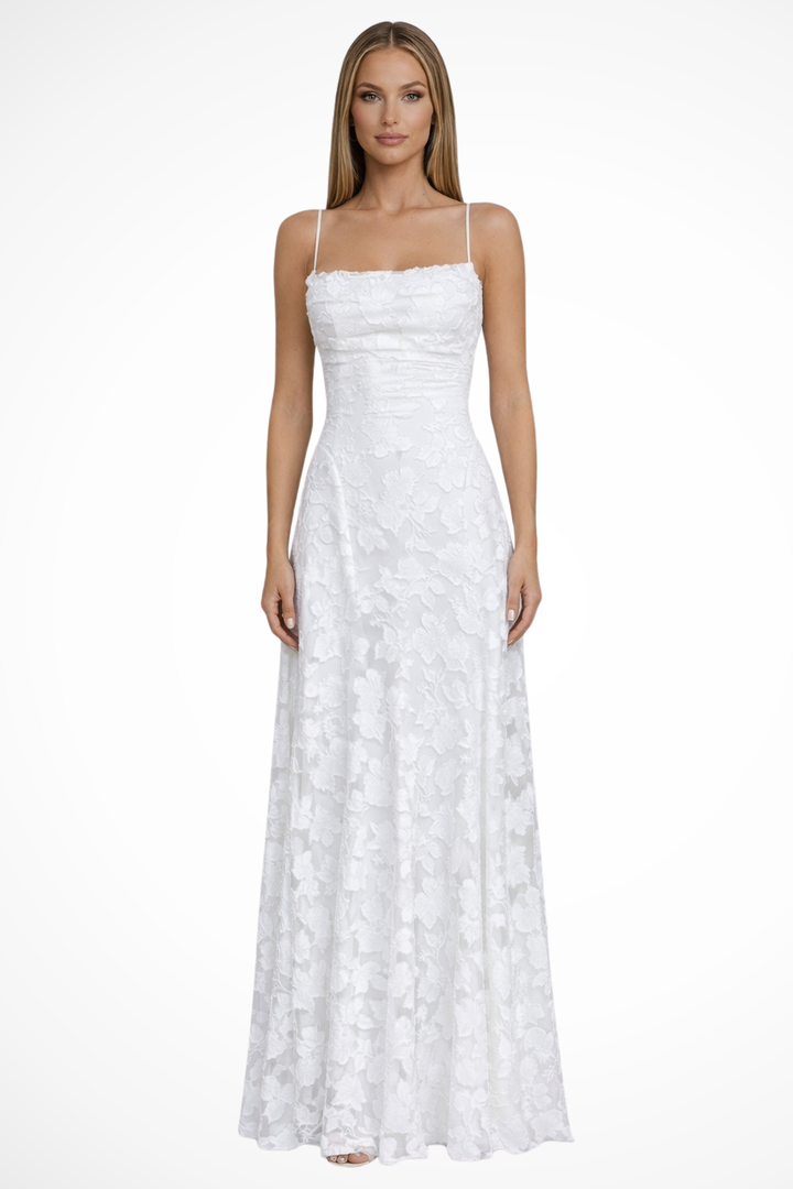 Textured floral jacquard formal maxi dress for women. Features a flattering lace-up back, perfect for parties.