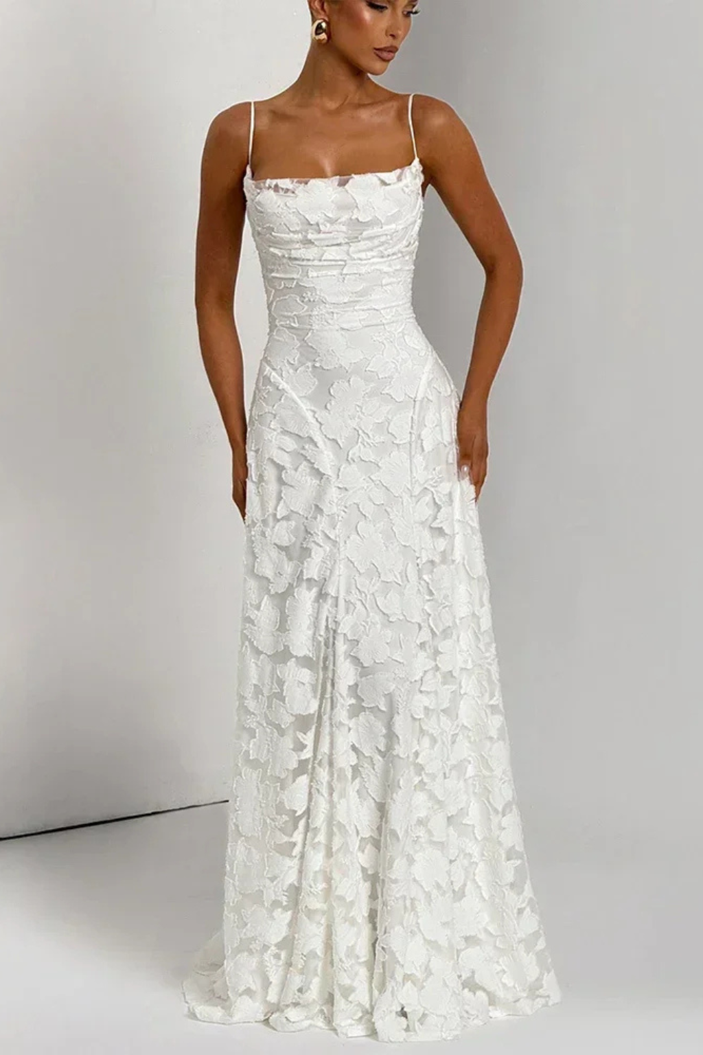 Trendy floral jacquard maxi dress with a chic lace-up back for women. An elegant choice for formal evening wear.
