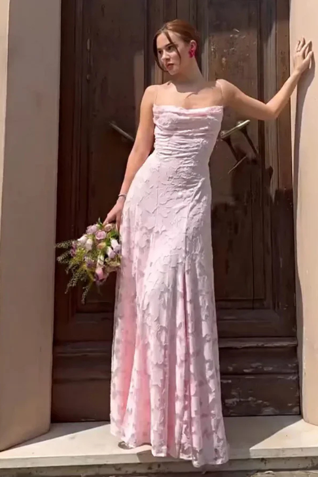 Beautiful floral jacquard maxi party dress for women. Features a flattering lace-up back, ideal for special occasions.