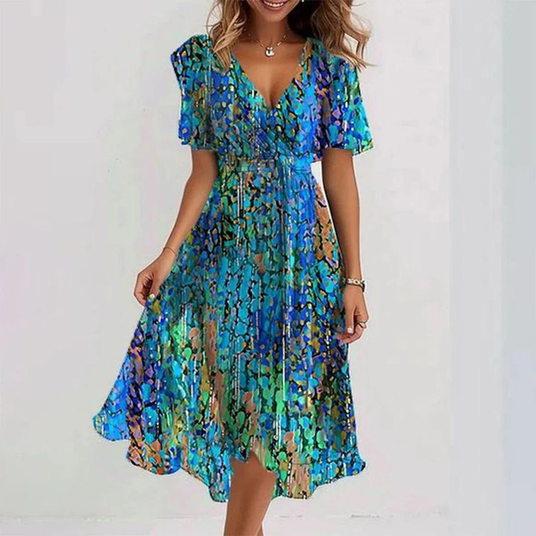 Stylish women's summer midi dress, delicate floral pattern, V-neck, flutter sleeves. Perfect for parties.
