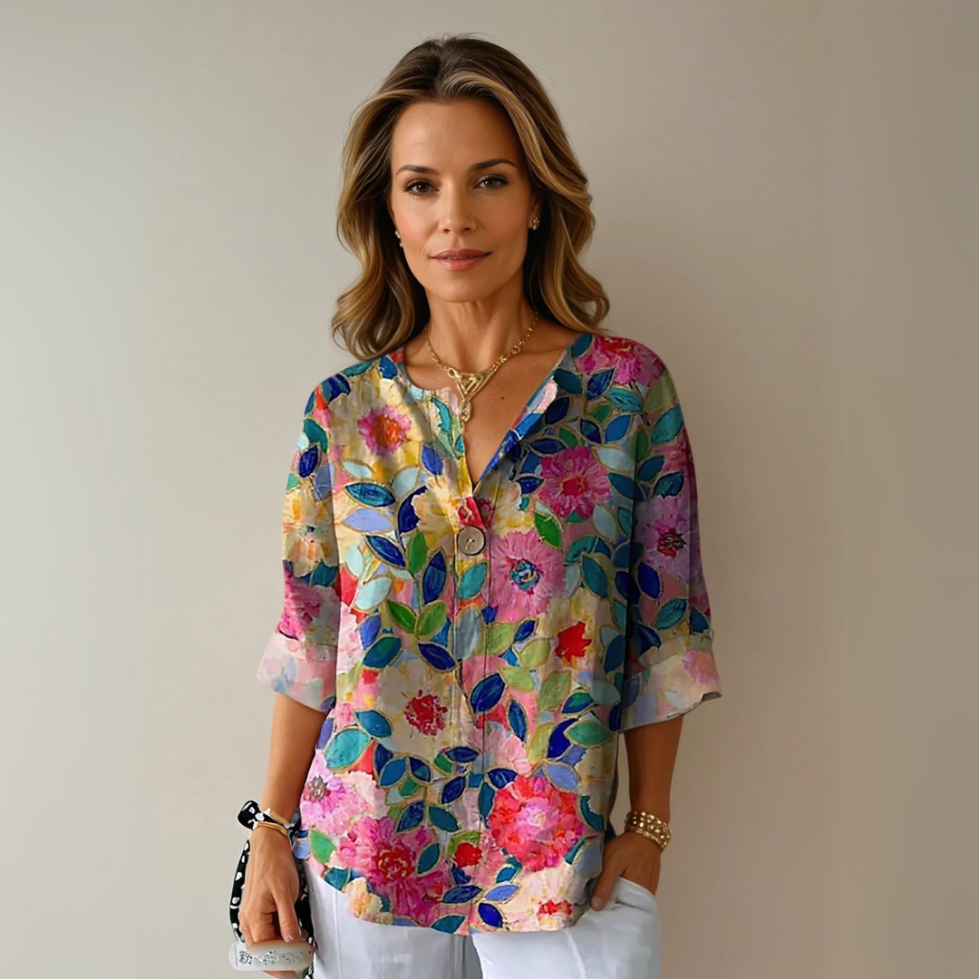 Elegant women's floral print 3/4 sleeve button-down blouse, perfect for spring & summer casual style.