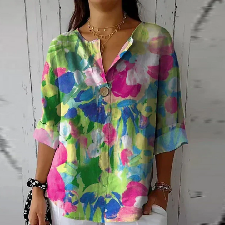 Ladies' floral print blouse, 3/4 sleeve, button-down, a relaxed fit top for everyday fashion.