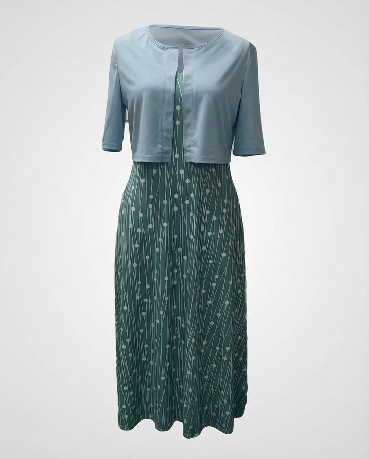 Feminine elegant floral two-piece dress set for women. Crop top & skirt combination, ideal for summer casual or parties.