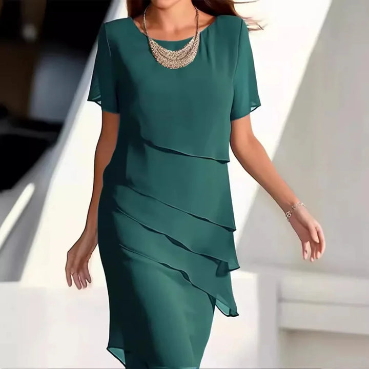 New women's elegant flowy midi dress, short sleeve & round neck. Versatile for spring & summer comfort and style.