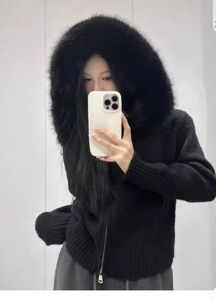 Fashionable women's hooded winter jacket with luxurious fur trim. Stay warm & chic in cold weather.