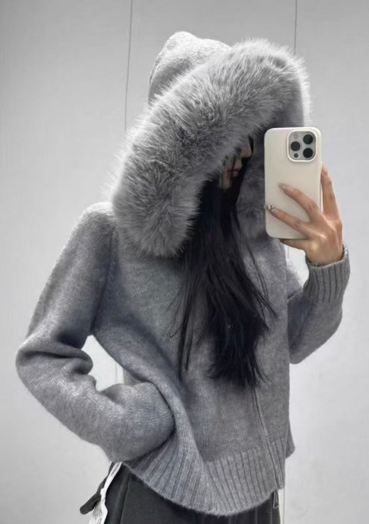 Chic women's elegant fur-trim hooded jacket, a stylish & warm option for winter and cold weather.