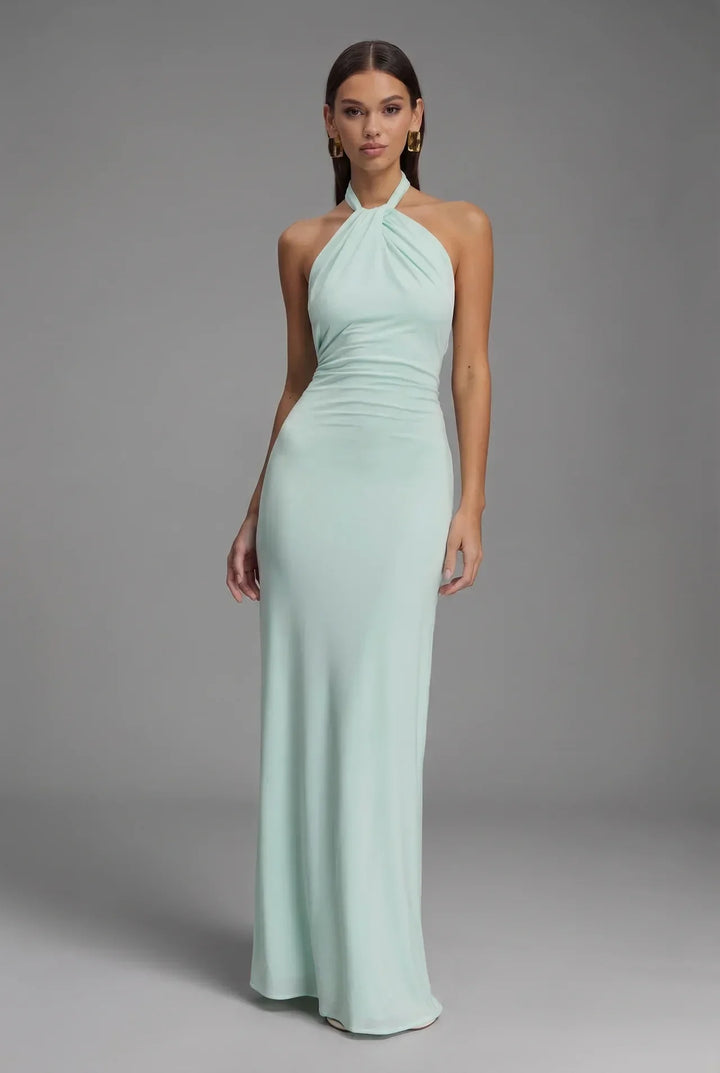 Elegant women's halter neck backless ruched maxi dress, perfect for evening wear or wedding guests.