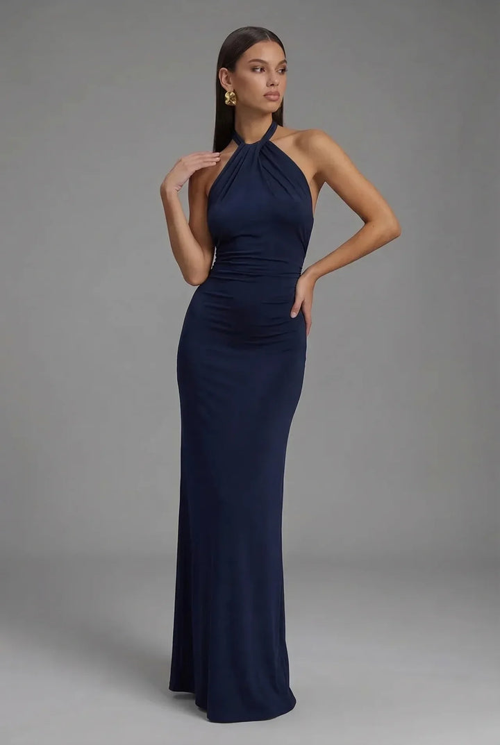 Chic women's halter neck maxi dress with elegant backless & ruched details, perfect for formal evening wear.